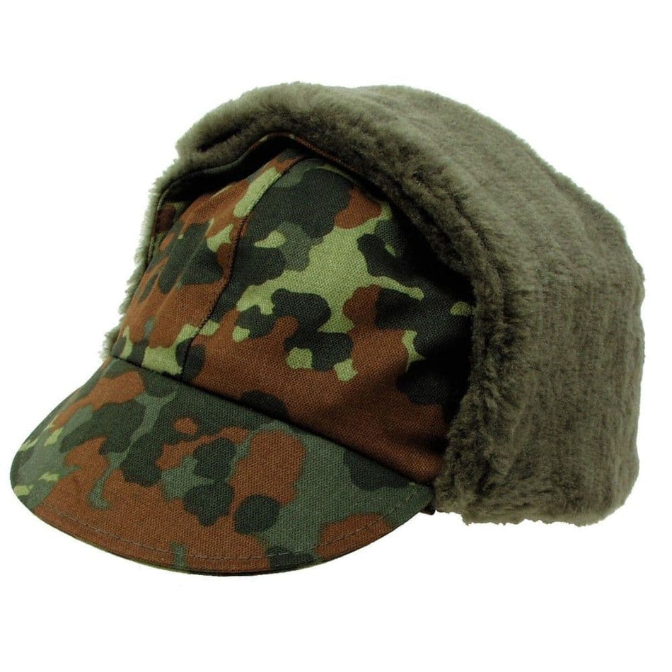 Military surplus gear including rucksack, clothing, and tactical equipment
